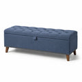 Banc de rangement en tissu bleu avec pieds en bois