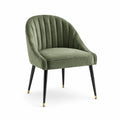 Chaise en velours vert avec pieds en métal noir