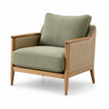 Fauteuil en bois avec tissu polyester vert et accoudoirs en rotin